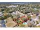 Aerial view of the property highlighting lot lines, surrounding neighborhood, and nearby amenities at 61 West Highbanks, Debary, FL 32713