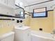 The bathroom features a tiled shower-tub combination, a sink, and decorative tiling accents at 61 West Highbanks, Debary, FL 32713