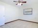Bedroom featuring neutral walls, tile flooring, and a window for natural light at 61 West Highbanks, Debary, FL 32713