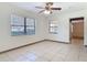 Bedroom with tile flooring, neutral walls, and a window providing natural light at 61 West Highbanks, Debary, FL 32713