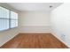 Bright, open living room with hardwood floors, neutral walls, and plenty of natural light at 61 West Highbanks, Debary, FL 32713