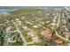 Charming residential area with single Gathering homes surrounded by lush greenery and a nearby waterway at 65 Calumet Ave, Ponce Inlet, FL 32127