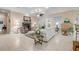 Spacious living room with neutral tones, fireplace, and tile flooring at 65 Calumet Ave, Ponce Inlet, FL 32127