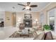 Inviting living room with fireplace and neutral decor at 65 Calumet Ave, Ponce Inlet, FL 32127
