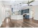 Open-concept living area with a modern kitchen, stylish island and seamless flow at 711 Hiview Cir, Port Orange, FL 32127