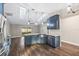 Modern kitchen featuring stainless steel appliances, large island and lots of natural light at 711 Hiview Cir, Port Orange, FL 32127