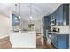 Well-equipped kitchen with stainless steel appliances, stylish countertops, and pendant lights at 711 Hiview Cir, Port Orange, FL 32127