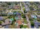 Neighborhood aerial view showing the location of the home and the surrounding community and swimming pools at 901 Ponca Trl, Maitland, FL 32751