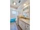 Bathroom with granite countertop vanity, updated fixtures, and a bright, inviting ambiance at 901 Ponca Trl, Maitland, FL 32751