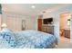 Spacious bedroom featuring a large closet, ensuite bathroom, and comfortable bedding at 901 Ponca Trl, Maitland, FL 32751
