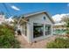 The bonus room with large windows offers ample natural light and great views of the pool and backyard at 901 Ponca Trl, Maitland, FL 32751