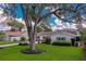 Charming single Gathering home with a beautiful landscaped yard with mature trees in a sunny neighborhood at 901 Ponca Trl, Maitland, FL 32751