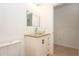 Bathroom featuring a glass vessel sink atop a granite countertop and vanity at 926 Sycamore St, Daytona Beach, FL 32114