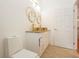 Modern bathroom featuring a double vessel sink, gold fixtures, and updated vanity at 926 Sycamore St, Daytona Beach, FL 32114