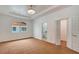 Bedroom features a window view, neutral carpet, and access to an ensuite bathroom at 926 Sycamore St, Daytona Beach, FL 32114