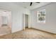 Bedroom with neutral carpet, closet and doorway leading to hallway at 926 Sycamore St, Daytona Beach, FL 32114
