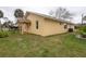 Exterior view of the home, showcasing the siding, windows, and well-maintained lawn at 926 Sycamore St, Daytona Beach, FL 32114