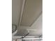 There is access to the attic located in the garage at 961 Oakwood Rd, Orange City, FL 32763