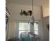 Dining room with chandelier and modern wall art at 961 Oakwood Rd, Orange City, FL 32763