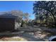 Long driveway and view of the backyard from side of house at 961 Oakwood Rd, Orange City, FL 32763