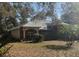 Well-kept one-story house featuring a manicured front lawn and traditional architectural design at 961 Oakwood Rd, Orange City, FL 32763