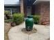 Charming home exterior with landscaped front yard and decorative urn at 961 Oakwood Rd, Orange City, FL 32763