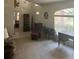 Cozy living room with ample natural light and comfortable seating arrangement at 961 Oakwood Rd, Orange City, FL 32763