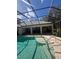 Enjoy this screened-in pool with a covered lanai, perfect for outdoor relaxation and entertainment at 961 Oakwood Rd, Orange City, FL 32763