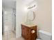 Bathroom featuring a stylish glass bowl sink and modern vanity at 1576 Naples Cir, Deltona, FL 32738