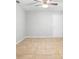 Expansive Living room with Tile Floors, ceiling fan and a back door for easy outside access at 1576 Naples Cir, Deltona, FL 32738