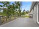This patio features a spacious layout and grey railings at 1576 Naples Cir, Deltona, FL 32738