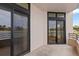 Private balcony with sliding glass doors, offering outdoor space and fresh air at 1 Oceans West Blvd # 1B2, Daytona Beach, FL 32118