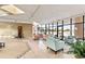 Inviting lobby space featuring comfortable seating, tiled floors, and large windows for plenty of natural light at 1 Oceans West Blvd # 1B2, Daytona Beach, FL 32118