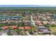 Sprawling community featuring lush landscaping, tranquil ponds, and beautiful homes at 100 Via Rosa Ct, Debary, FL 32713