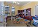Charming playroom featuring built-in bookshelves, toys, and play areas for enjoyment and creativity at 100 Via Rosa Ct, Debary, FL 32713