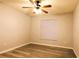 Neutral bedroom with ceiling fan and window letting in natural light at 1013 Matterhorn St, Deltona, FL 32725