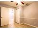 Neutral bedroom with light-colored floors, closet, and updated trim at 1013 Matterhorn St, Deltona, FL 32725