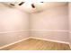 Bedroom with natural light, chair rail and laminate flooring at 1013 Matterhorn St, Deltona, FL 32725