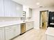 Updated kitchen featuring new cabinets, quartz countertops, and stainless steel appliances at 1013 Matterhorn St, Deltona, FL 32725