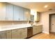 Updated kitchen boasts stylish cabinets, stainless steel appliances, and sleek countertops, offering modern convenience at 1013 Matterhorn St, Deltona, FL 32725