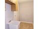 Functional laundry room with cabinet storage and wash basin sink at 1013 Matterhorn St, Deltona, FL 32725