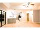 Bright, open-concept living room leads into the kitchen, featuring clean, modern finishes and natural light at 1013 Matterhorn St, Deltona, FL 32725