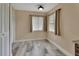 Dining area with modern wood-look tile flooring and natural lighting at 1033 Windbrook Dr, Deltona, FL 32725