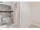 Bathroom featuring a shower/tub with decorative tile and updated fixtures at 1135 Holly Ave, Daytona Beach, FL 32117