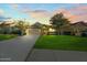 A well-maintained home features a lush lawn and mature trees at 118 Grande Belfly Way, Daytona Beach, FL 32124