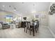 Spacious living and dining area with light plank flooring and natural light at 118 Grande Belfly Way, Daytona Beach, FL 32124