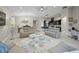 Open-concept living space with a comfortable seating area flowing into the kitchen and dining area at 118 Grande Belfly Way, Daytona Beach, FL 32124