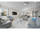 Bright and airy living room with modern furnishings, neutral tones, and plenty of natural light at 118 Grande Belfly Way, Daytona Beach, FL 32124