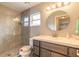 Updated bathroom features tile surround shower, stone vanity, and modern fixtures at 134 Deskin Dr, South Daytona, FL 32119