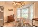 Cozy breakfast nook featuring a bay window and wood-look flooring at 134 Deskin Dr, South Daytona, FL 32119